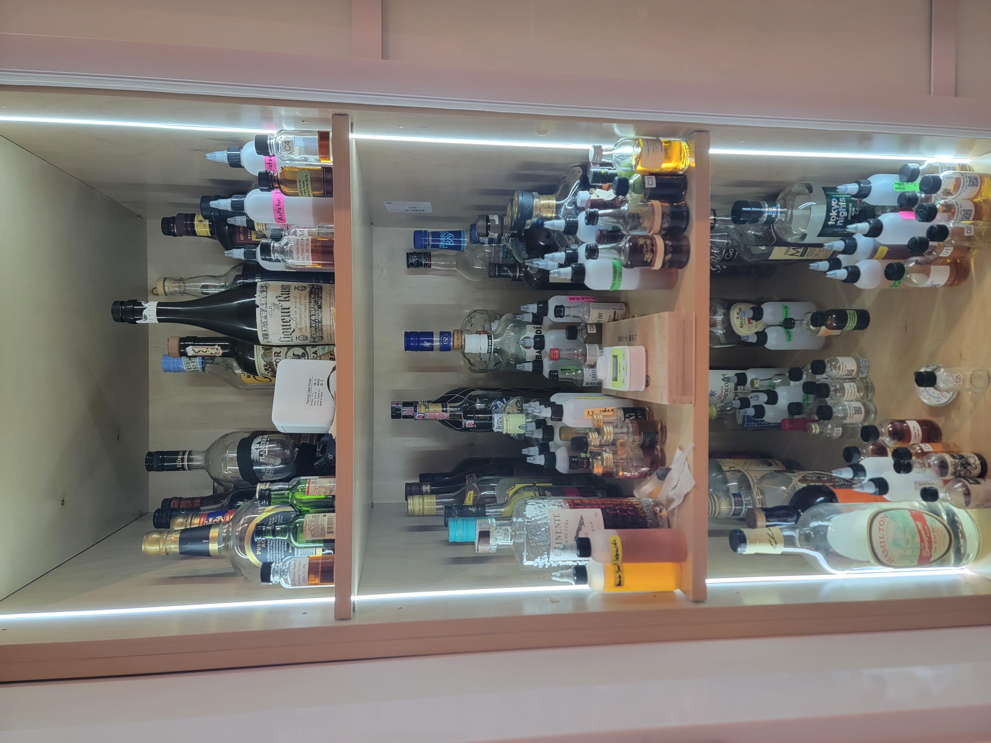 Rum liquor store shelf with 23 identified products