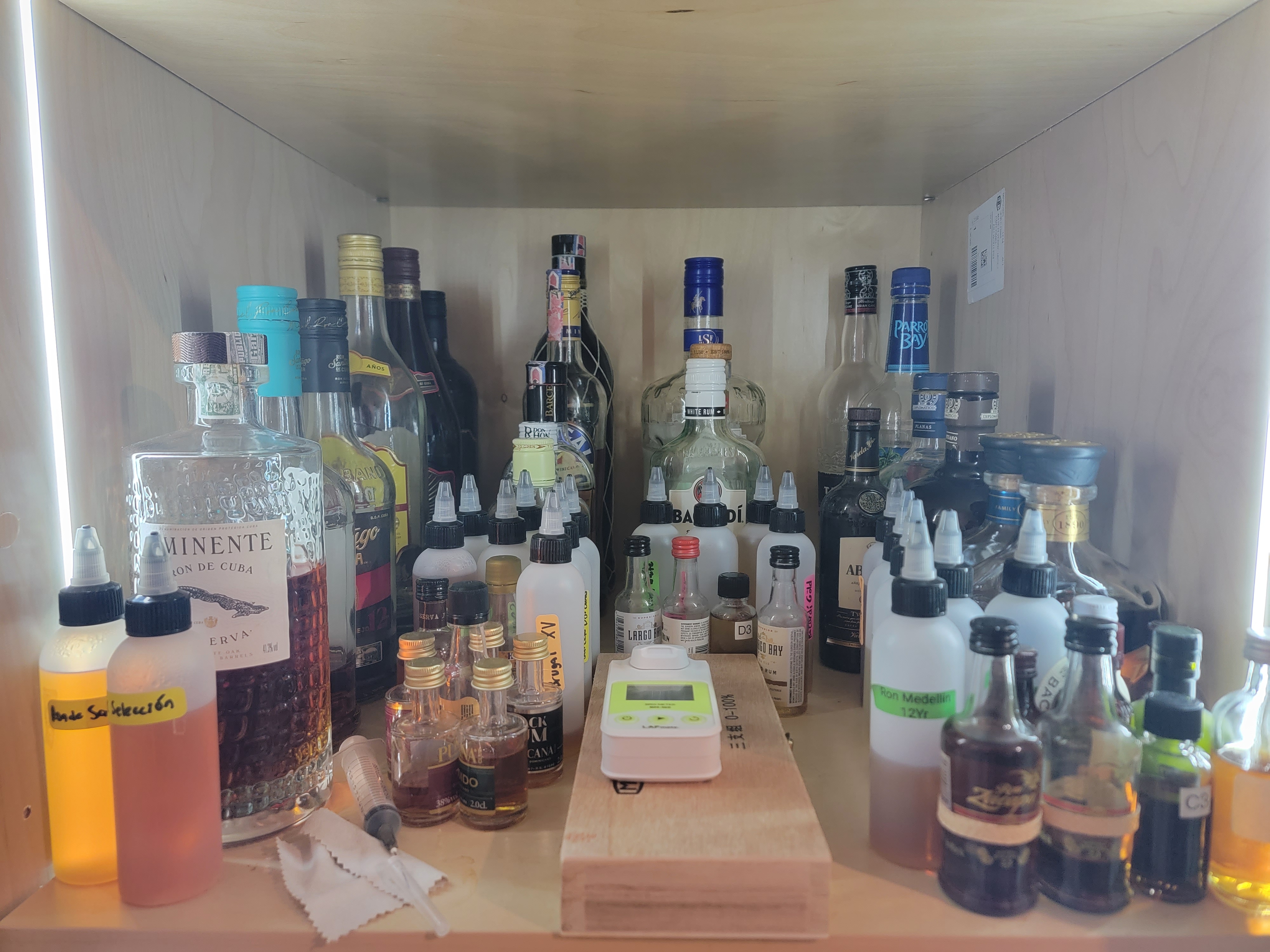 Rum liquor store shelf with 23 identified products